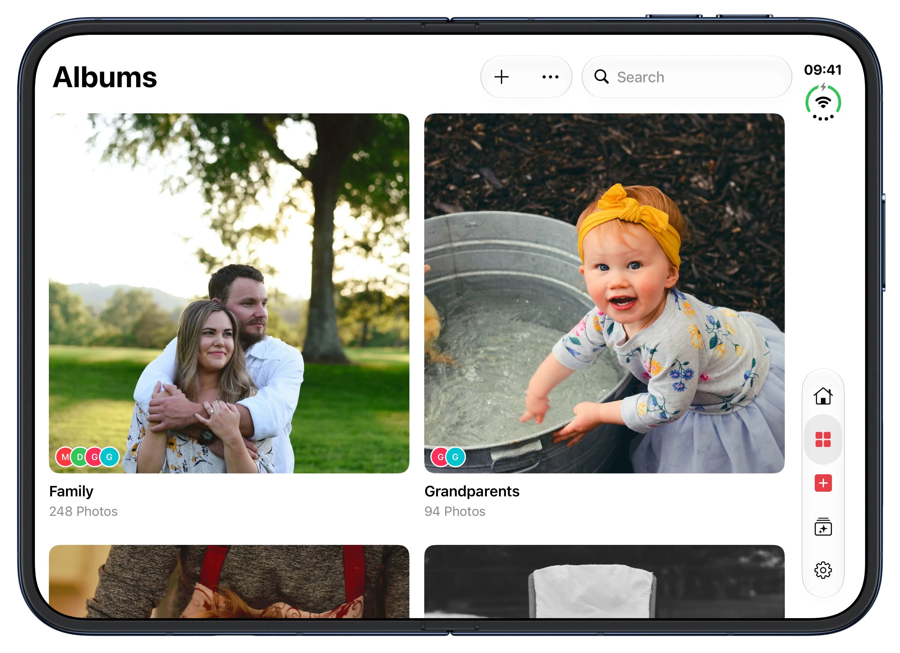 Family albums in Our Family Album on the open iPhone Duo